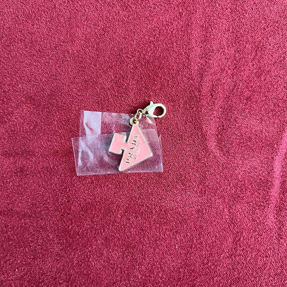 Prada “gift with purchase“ charm.